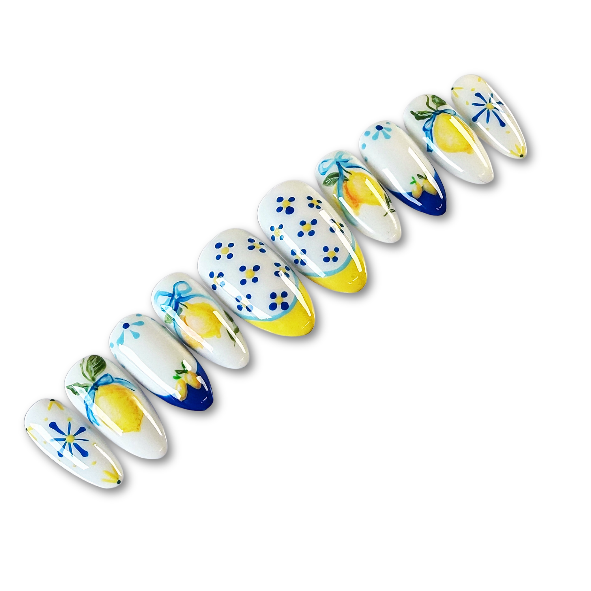 Decorative press on nails with lemons and flowers on a white background